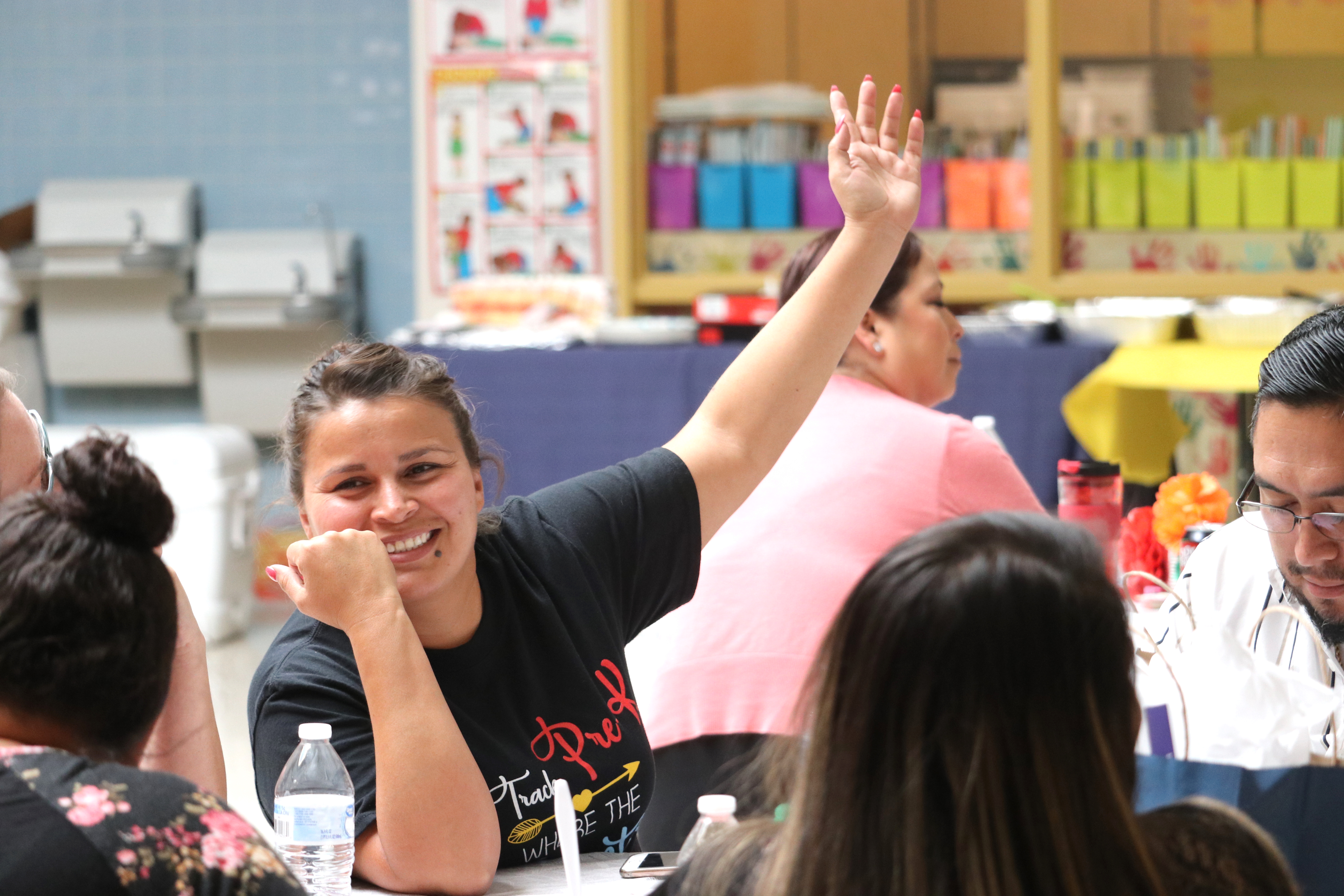 Nonprofit Conference Attendee raising hand